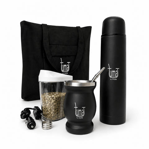 Black Tuma mate set with thermos, cup, and accessories on a black background